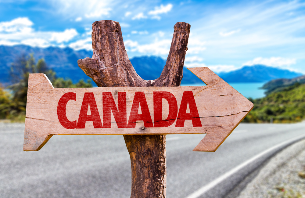 Featured image: Signpost of Canada - Read full post: From Surge to Contraction: Analyzing Canada’s Population Growth Reversal
